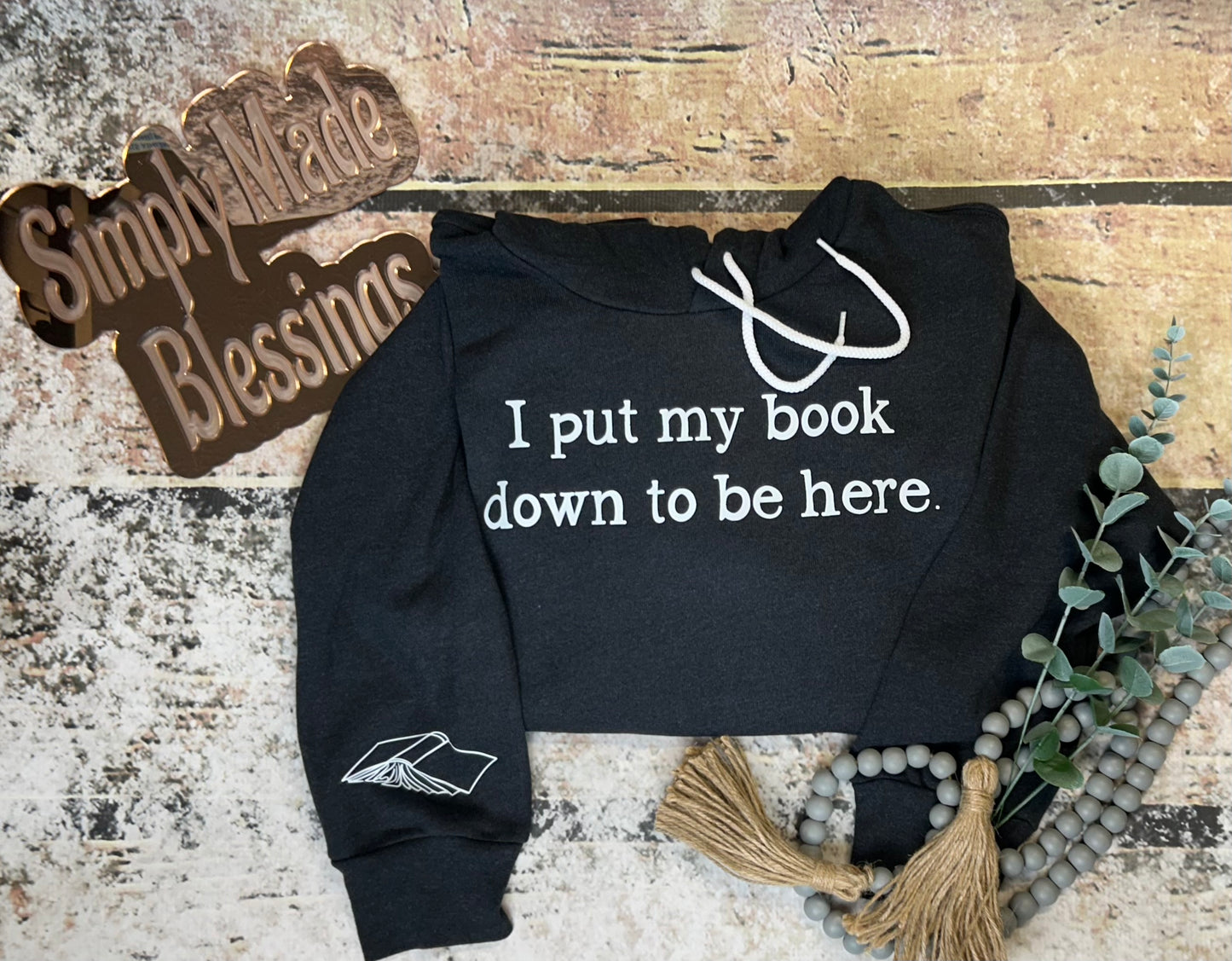 I put my book down to be here. Hooded Sweatshirt